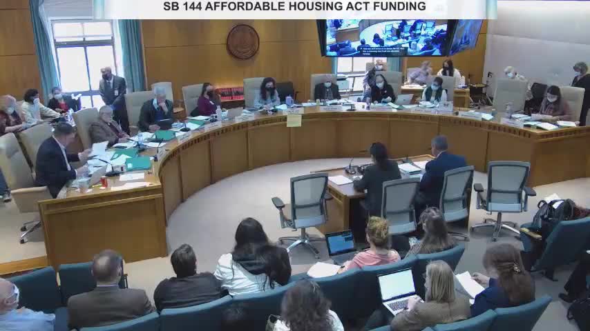 Committee advances amended $500 million housing trust fund plan after debate over local set‑aside and matching rules