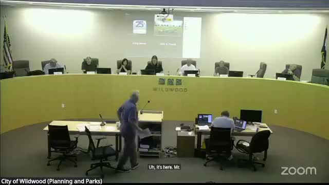 Wildwood staff asks commission to allow limited drive‑throughs along Route 109; public hearing held