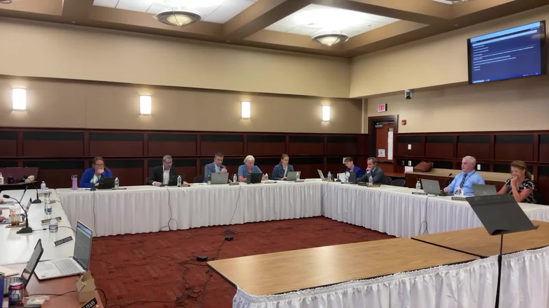 Finance committee reviews closeout projections and tax collections; resident raises questions about 4% tax increase