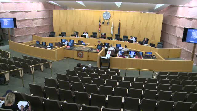 Multiple agenda items held at applicant request; staff says third hold triggers notification fees and 'good cause' requirement