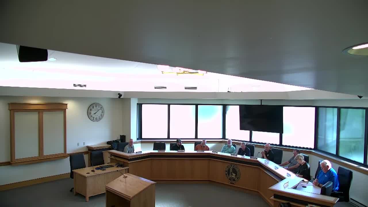 Committee debates repair versus reroute after road closure near slide area