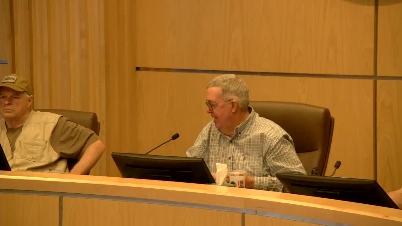 Board reviews draft interlocal for county public‑safety communications; formal agreements and budgets still pending