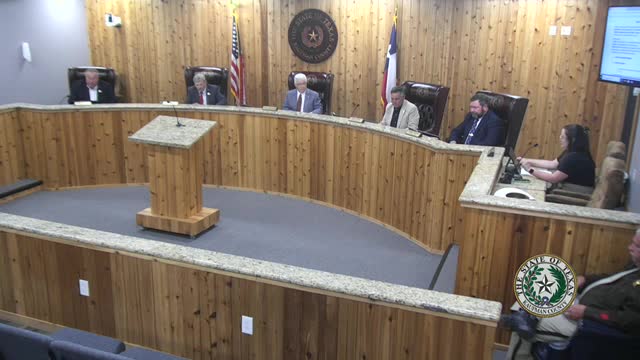 Commissioner Moore Leads Prayer at Downtown Coffman Meeting