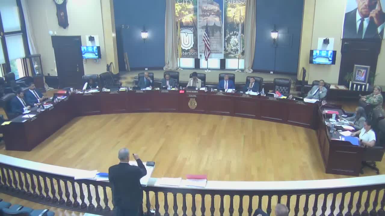 Council Meeting Confrontation Over School Employee Terminations Sparks Heated Debate