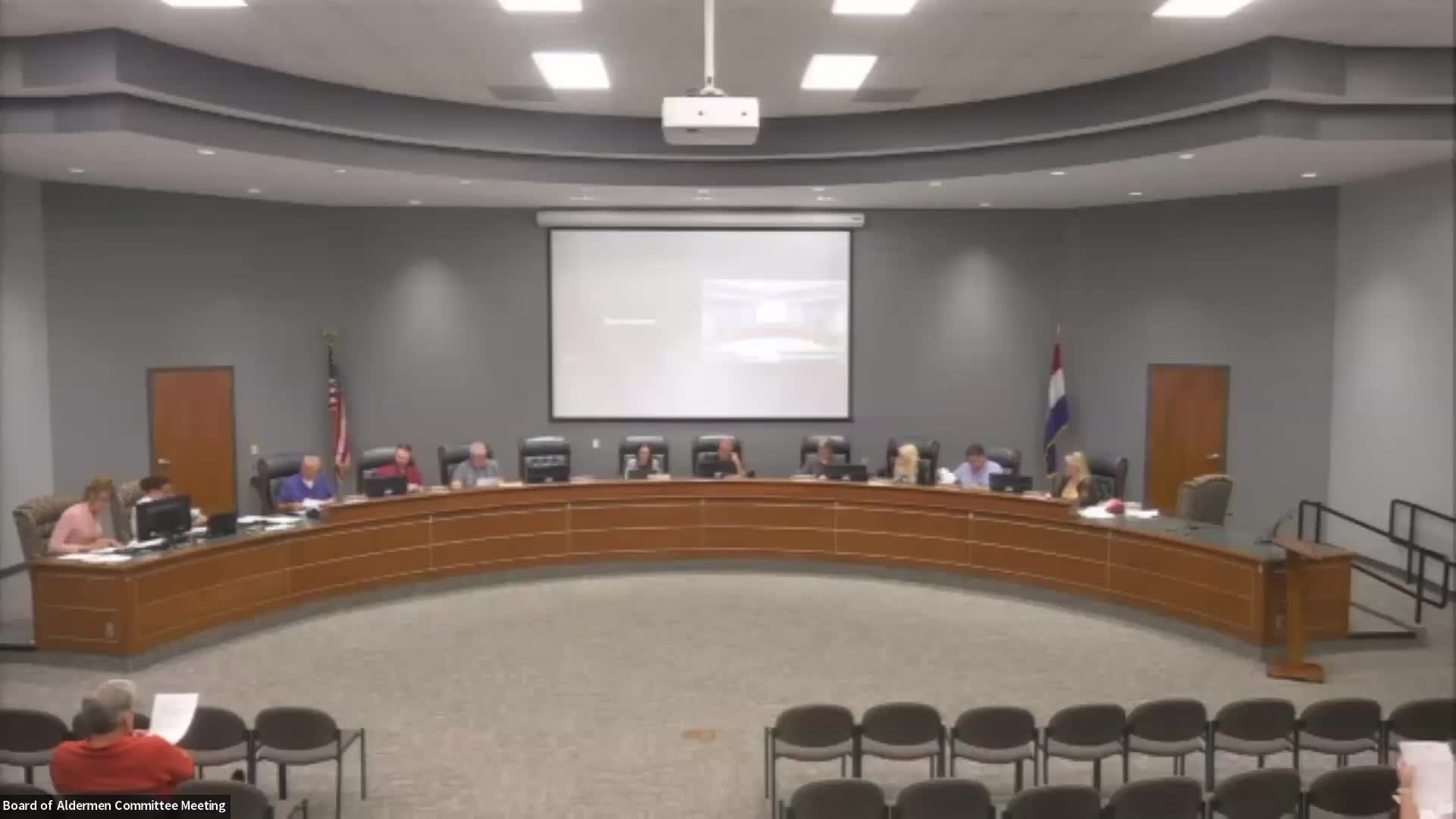 Aldermen approve new lettering for government center; county asked to fund police shield sign