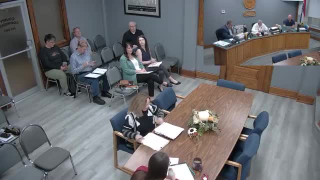 Commission approves printing and vehicle-graphics contracts; assessor notices contract estimated at $59,805