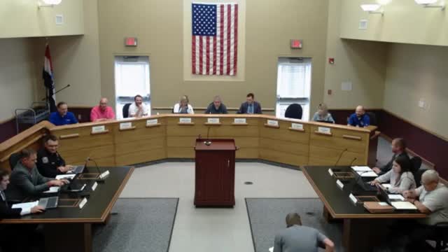 Resident warns of flooding risk to townhouse, asks city to reroute pond drainage