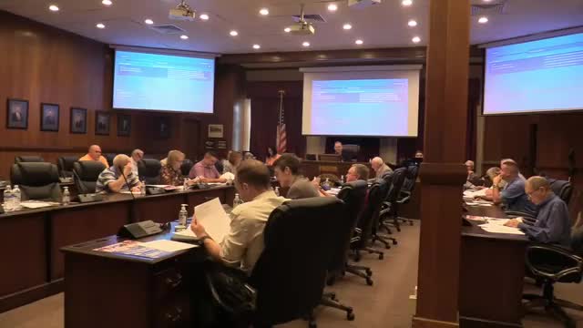 Commissioners debate using occupancy-tax revenue to hire outside tourism firm; RFQ discussion postponed