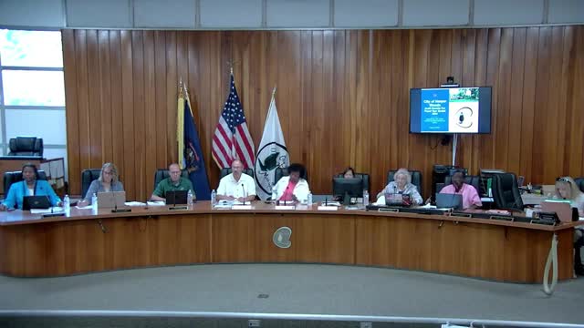 Council awards 2025 sidewalk replacement contract as residents press city on cleanup and contractor performance