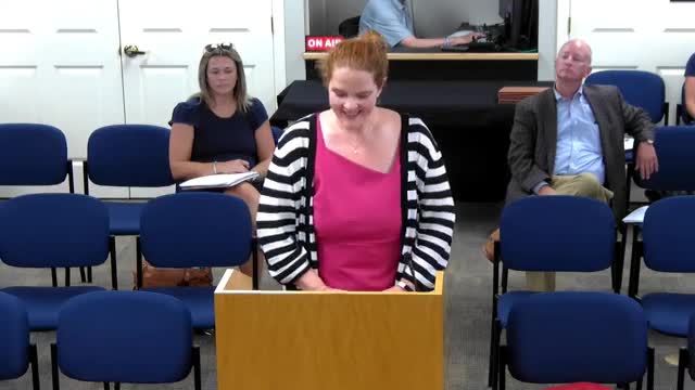 Parent warns of unsafe bus stop at Rotary and University; asks board to relocate stop