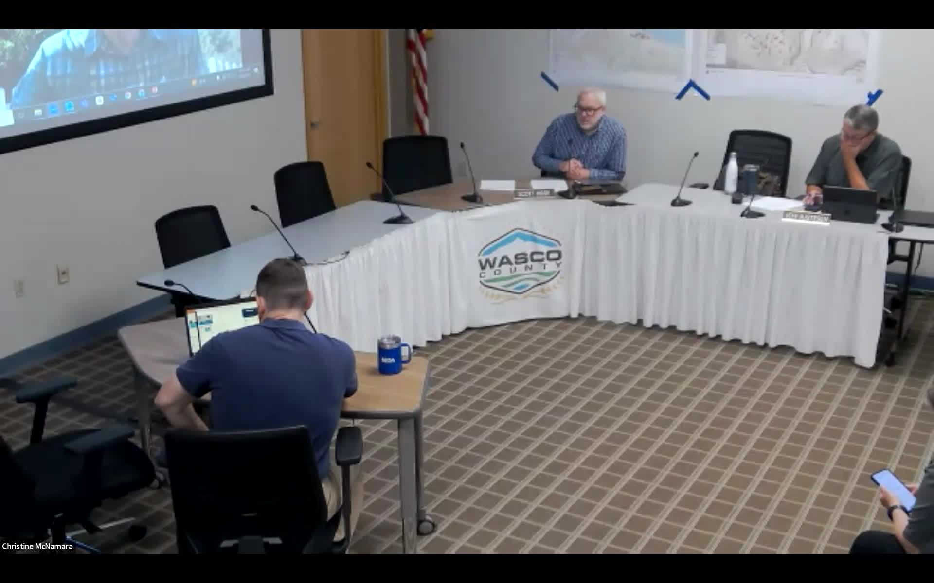 County planning staff presents temporary housing application for Rowena fire survivors; scenic-area cultural review expected