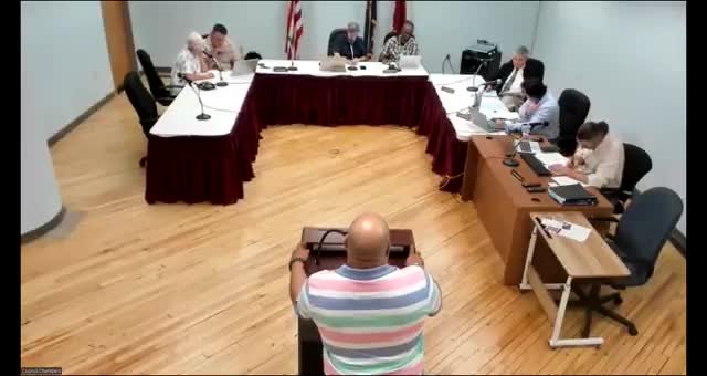 Candy factory seeks approval for 1,620‑sq‑ft elevated deck at 161 River Street; board asks for deed, survey and water‑main clearance