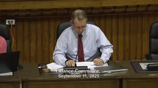 Committee approves parking-meter software payment; committee notes reserve funding source