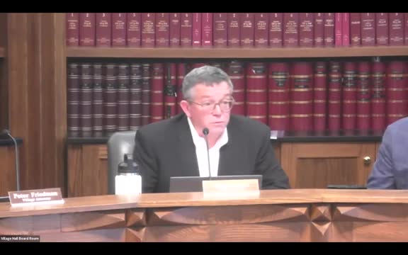 Village board approves first reading for indoor auto dealership, reduces parking requirement