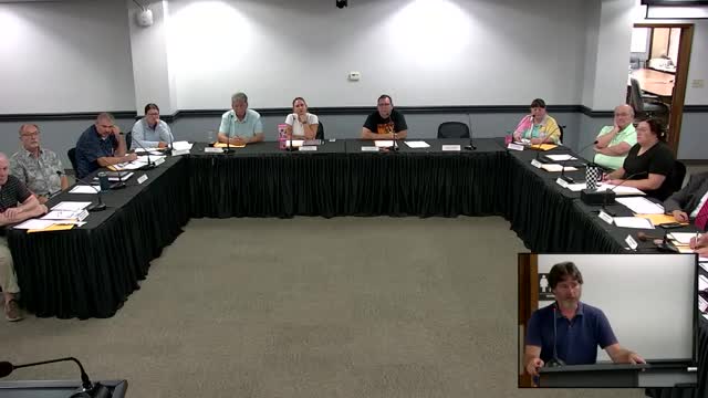 City updates council on parking-lot paving, Livingston Street curb work, deep sanitary lift‑station excavation and near-complete sidewalk project