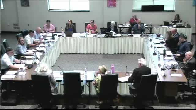 Isaac Baer early‑college building funding unclear; MOA assigns construction responsibility to school board