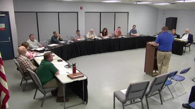 Zoning officer reports code enforcement, new permits, and upcoming developments