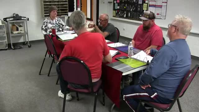 County Officials Discuss Cost Responsibilities for Rodeo Committee Tree Removal