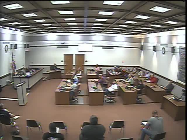 Board refers contested driveway variance back to highway committee after resident objections