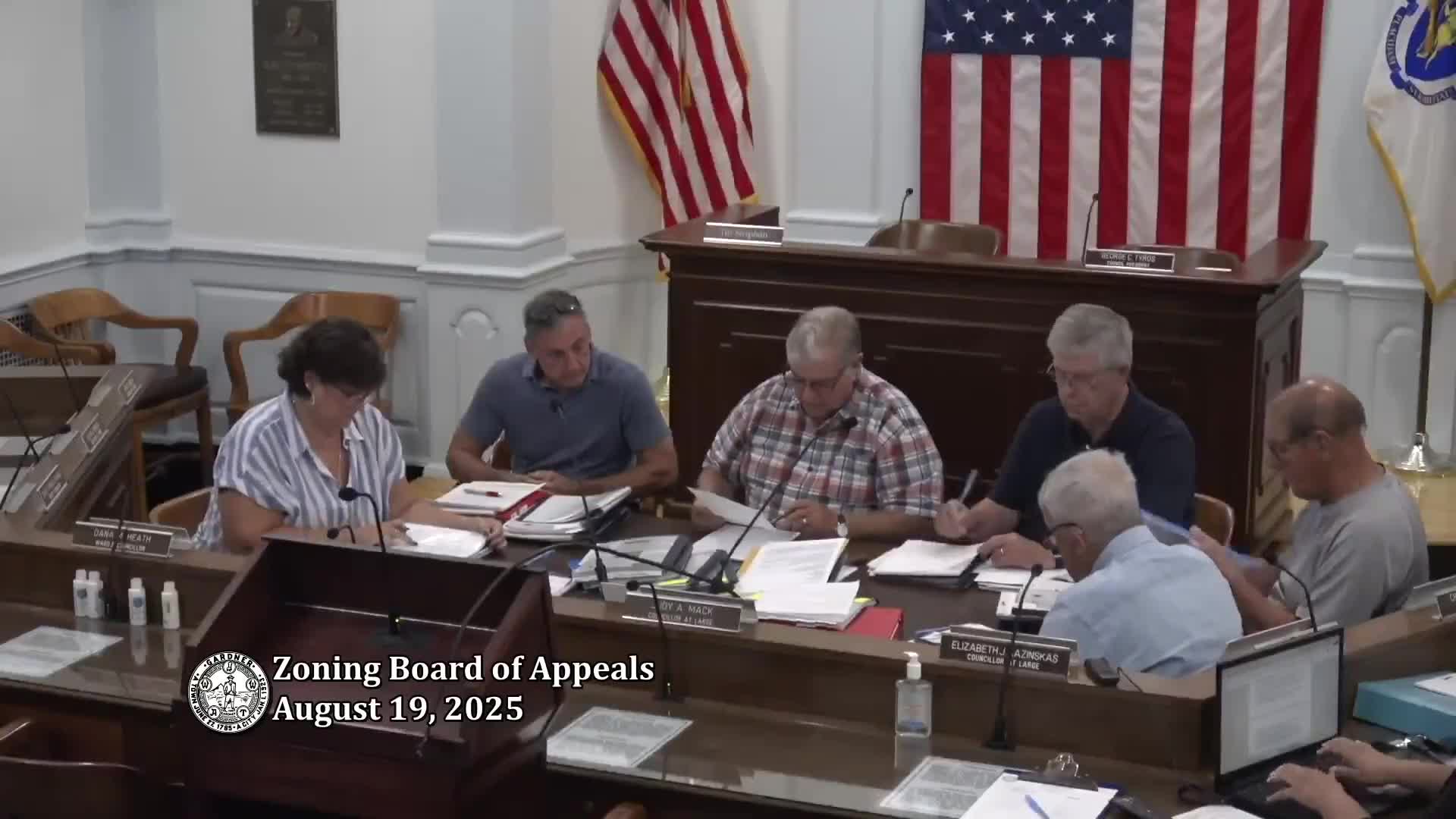 Zoning board denies modification that would cut parking and dwelling units at 163–165 Pine St.