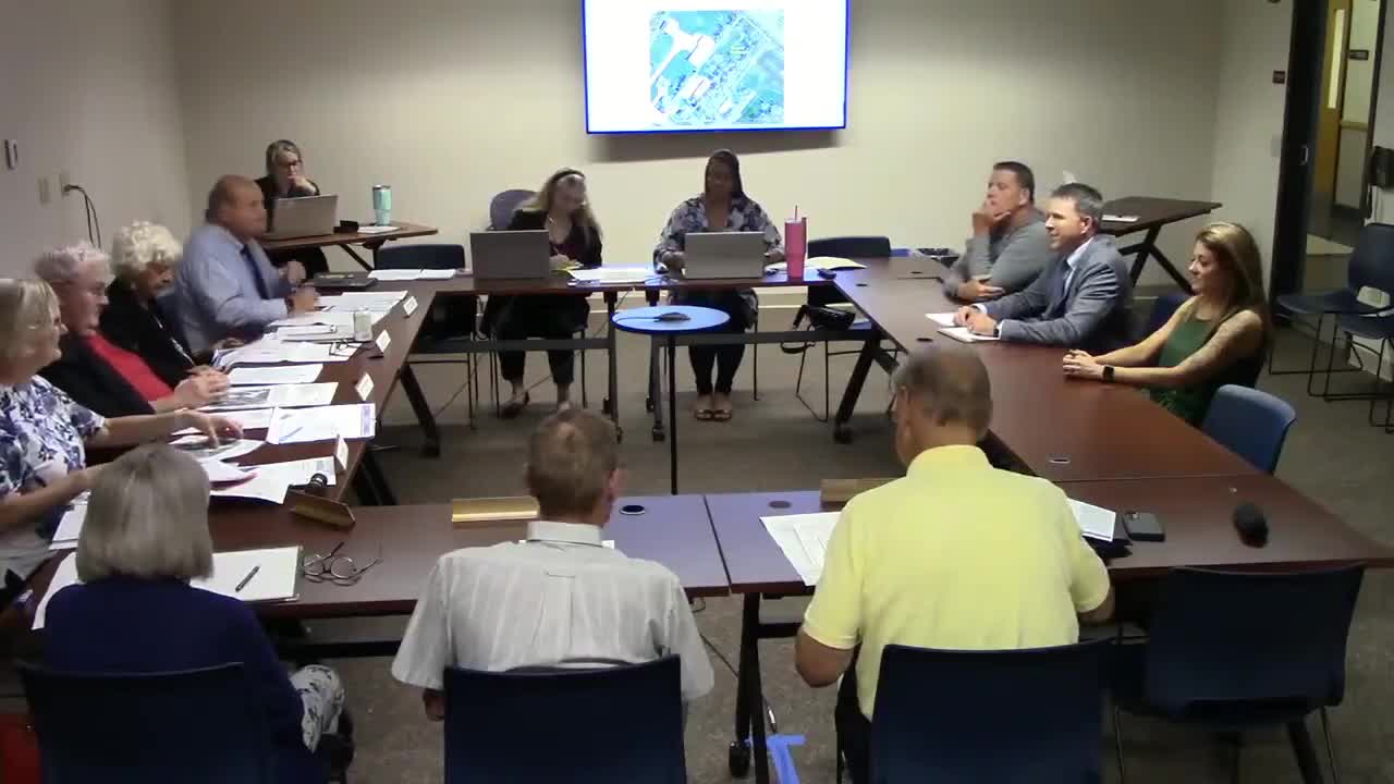 Board recommends rezoning Woodstock‑area parcel to residential, grants frontage variance