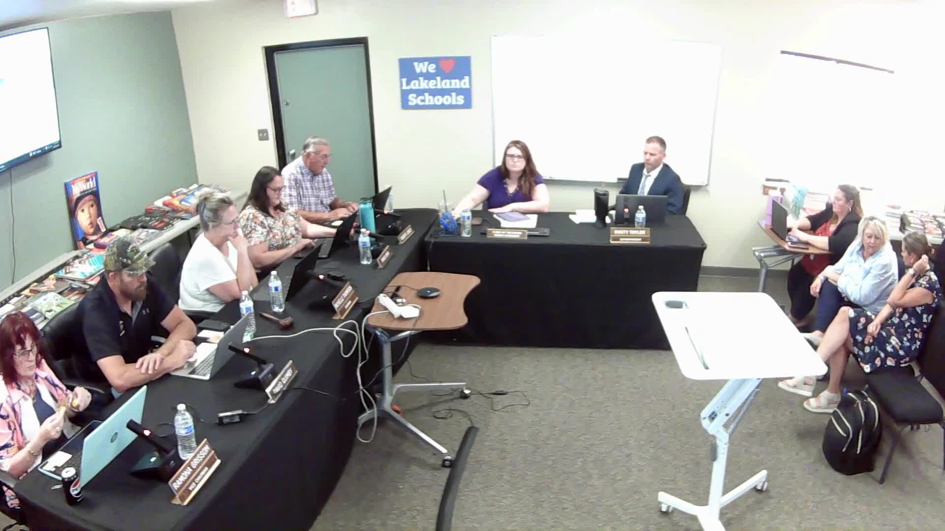 Board approves added stops after debate over 1.5-mile eligibility and family impacts