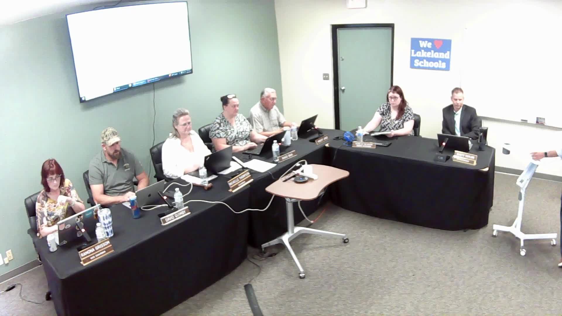 Board approves district handbooks; staff to schedule SIP and curriculum workshop with trustees