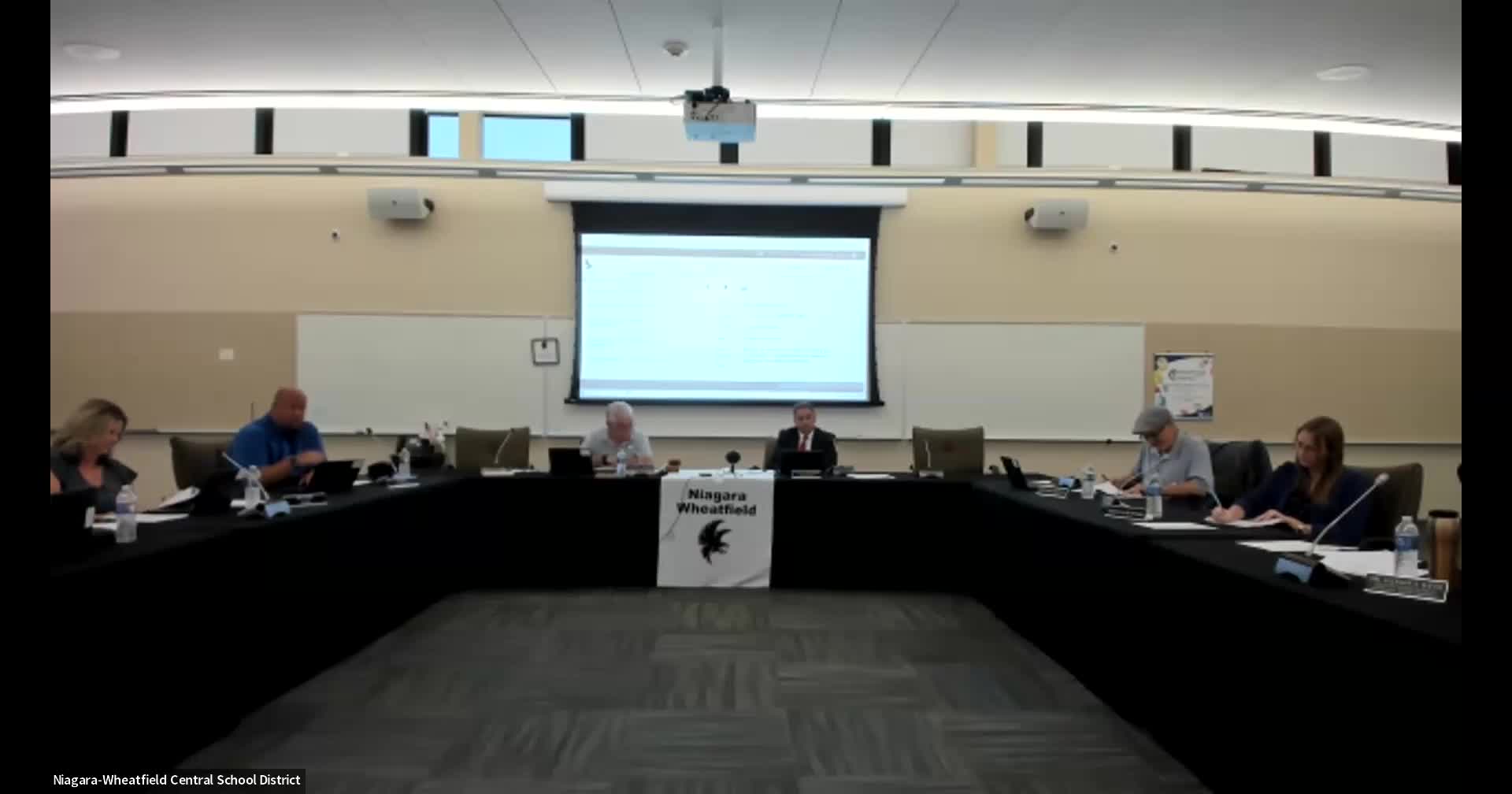 Board approves four new staff hires and adopts memorials policy; superintendent reports on auditorium and electric-bus study