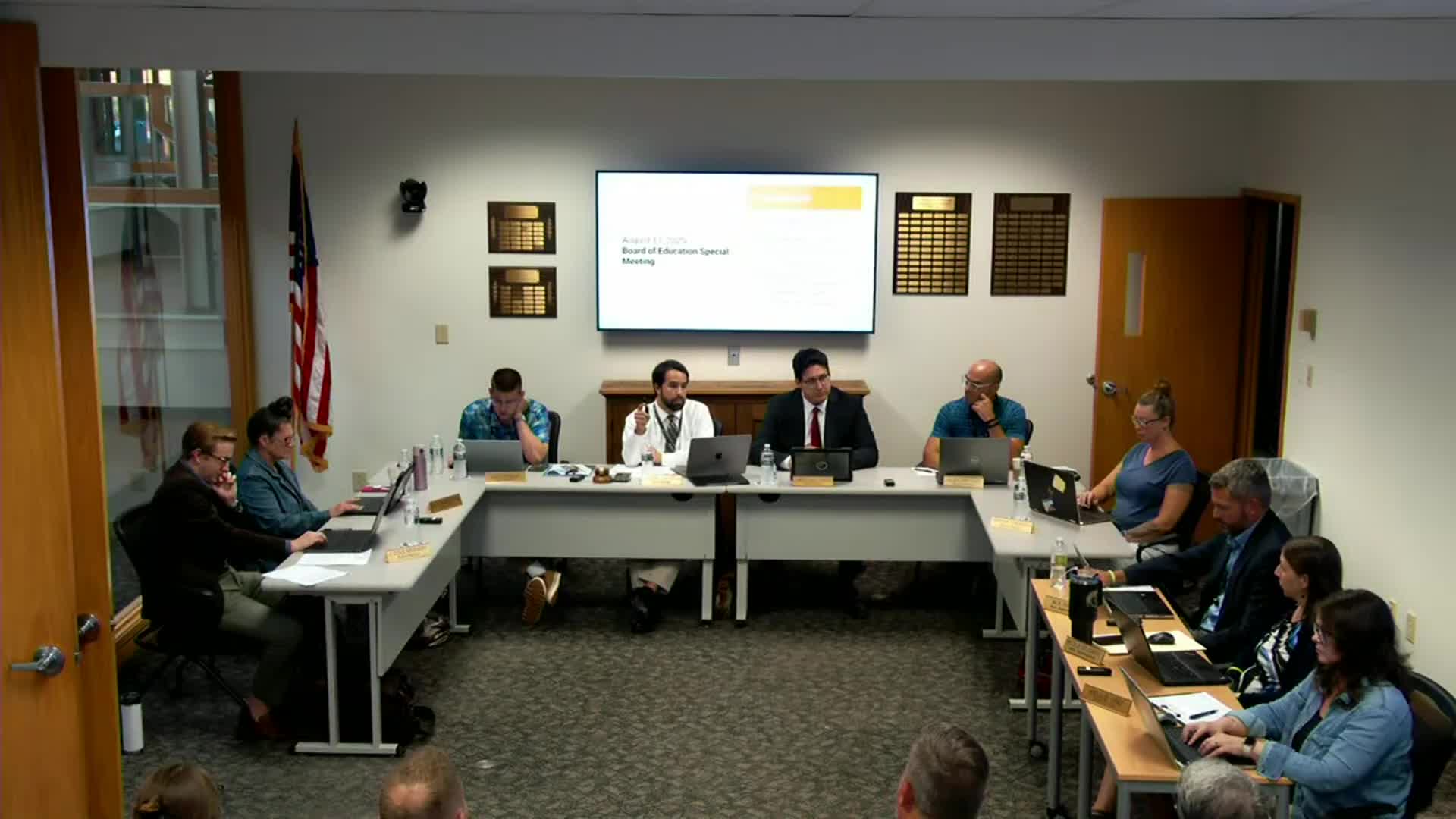 Board reviews sale process for 245 East Exchange Street; valuation and antenna issue noted