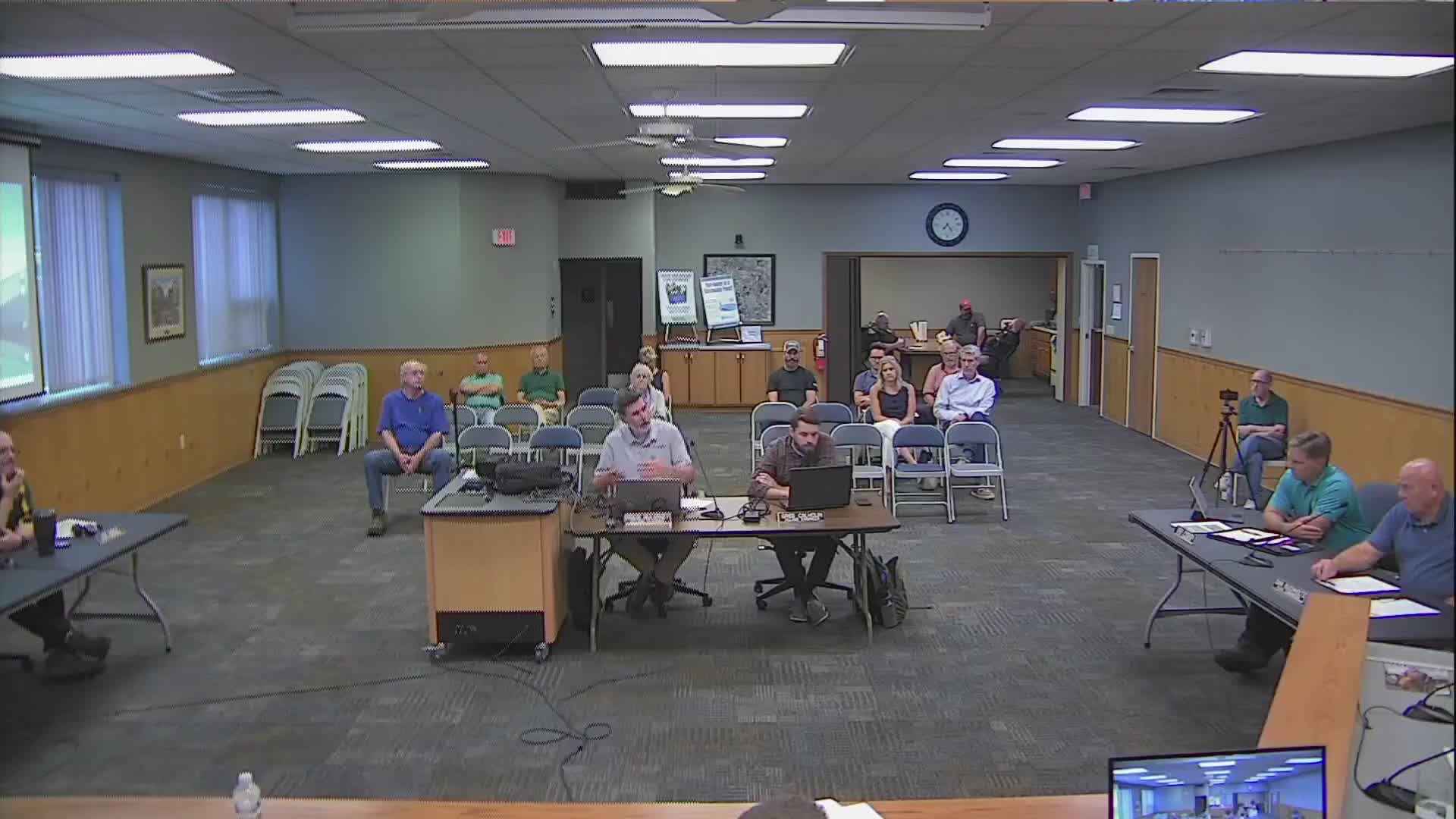 Board discusses aligning livestock-building setbacks with accessory setbacks, agrees to draft zoning amendments and add pigs to permitted uses
