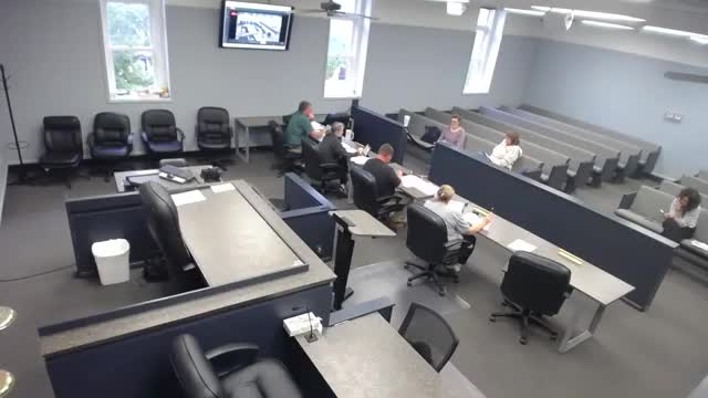 Committee debates 4-week paid parental leave; members urge gender-neutral, FMLA-aligned wording