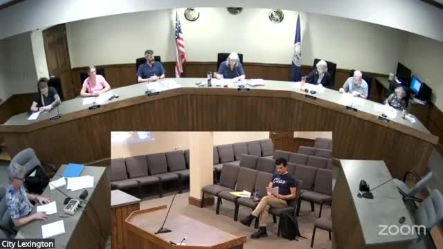 Planning commission debates internally lit canopy signs for downtown, delays vote to Oct. 23