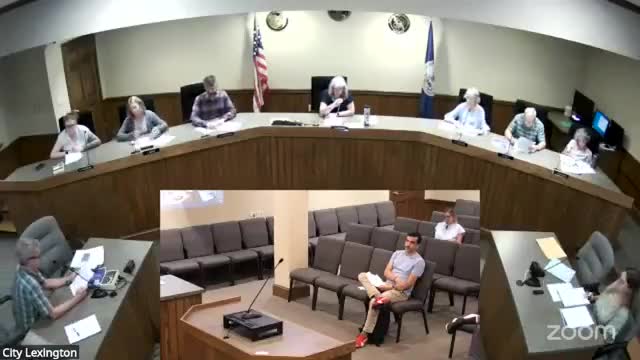 Commission postpones decision on illuminated canopy signs after technical, design questions