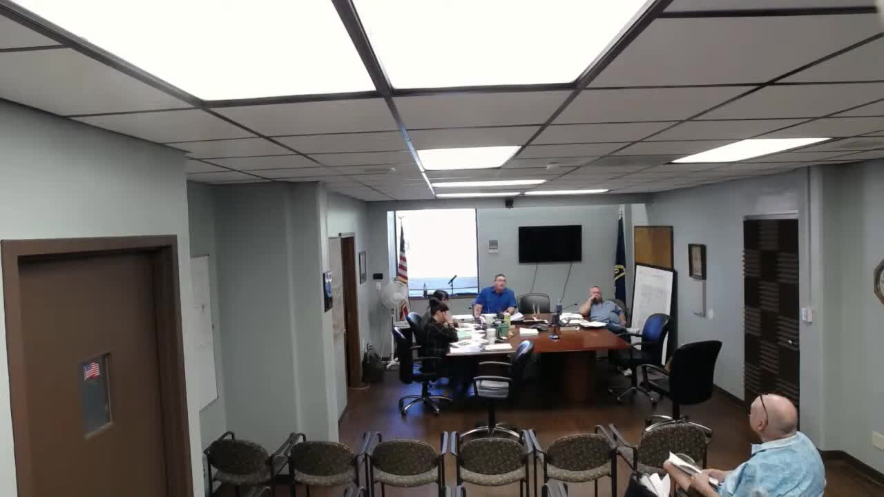 Dispute over 9‑1‑1 funding and city asphalt request puts county budget choices under pressure