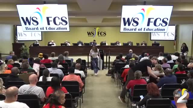 Winston-Salem/Forsyth board approves staff cuts after state audit finds long-running financial problems; parents, teachers protest EC reductions