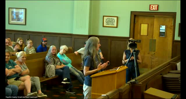 Kayla Dillo questions funding and accountability at Fayette County Humane Society meeting