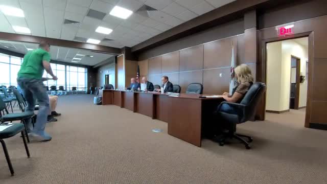 County staff present request to pay remaining $160,087 on downtown parking grant to City Cardhill