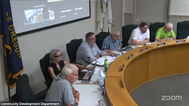 Board discusses transfer of two First Street parking lots; one lot leased to Commodore through 2053