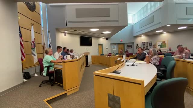 Small developer proposes 2 MW community solar farm near Armington; board members press screening and insurance details