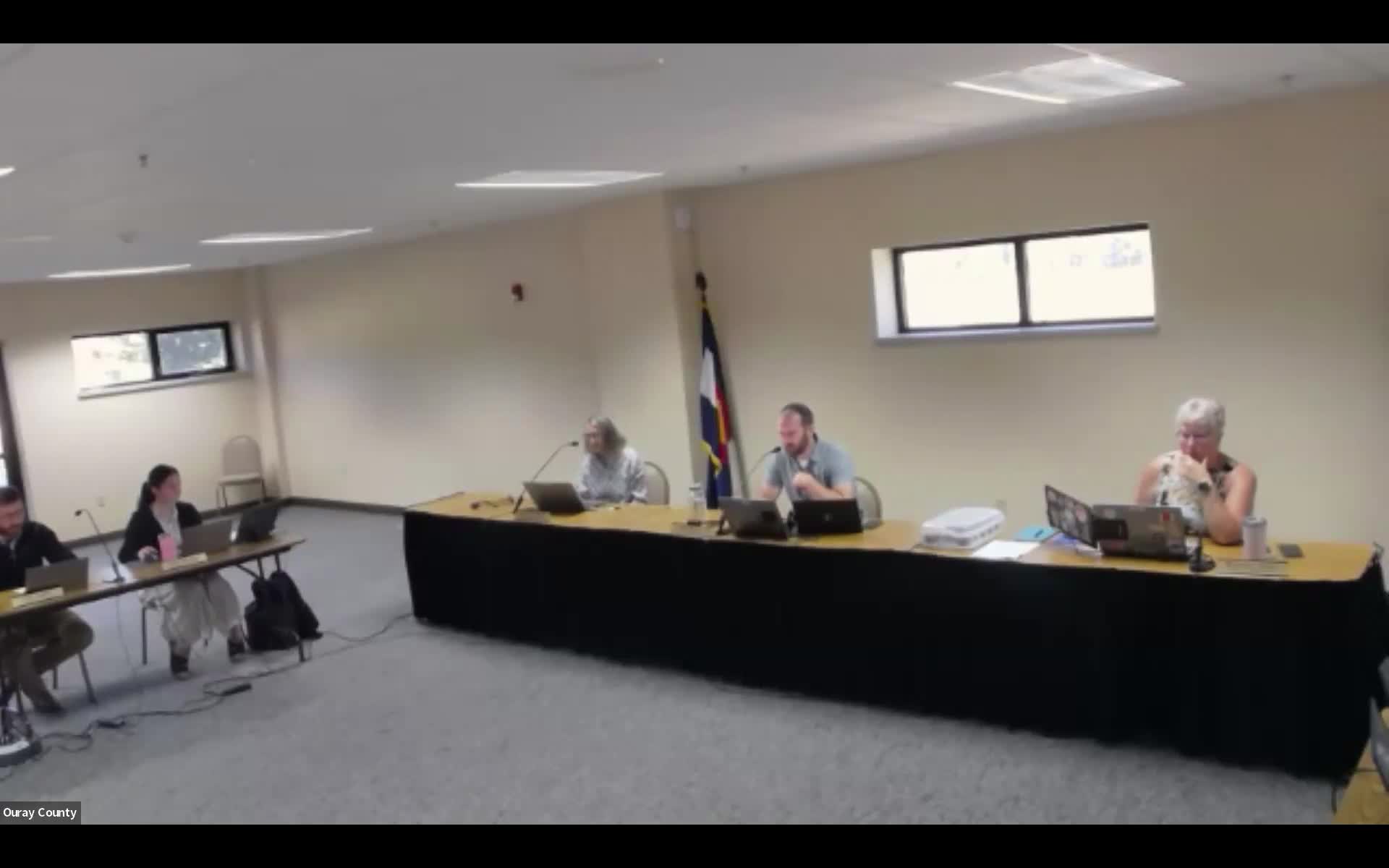 Board adopts midyear budget amendment for disaster costs; commissioner objects to using emergency management fund without replenishment