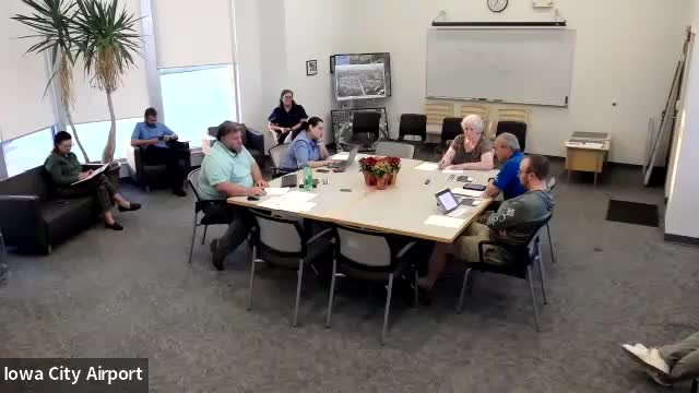 Airport staff report pavement maintenance, cracked solar panels and hangar projects; FAA approval and warranties awaited