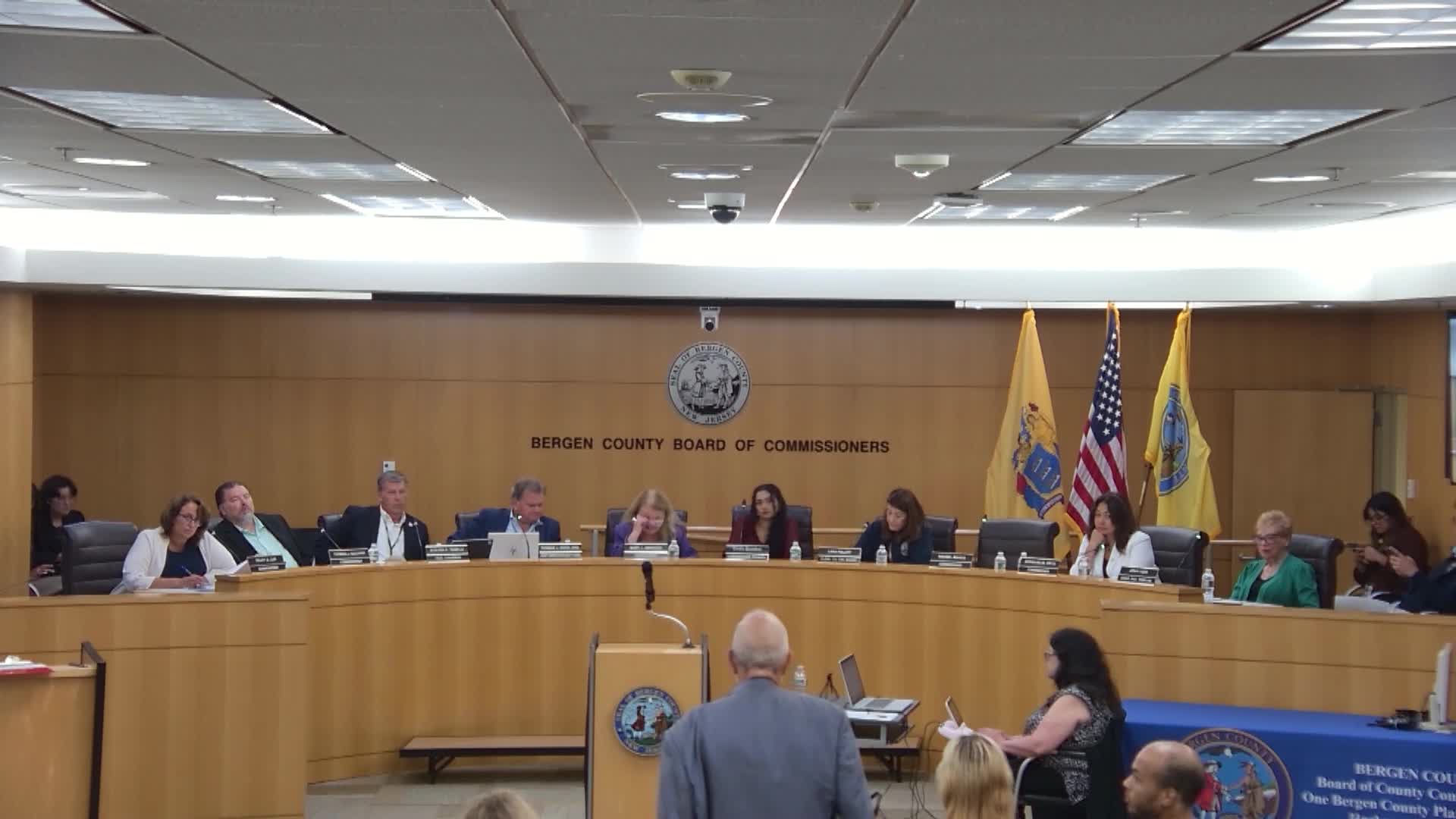 Public commenter criticizes legal resource center setup, urges electronic access for self‑represented litigants