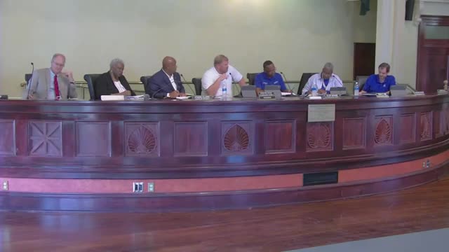 Council approves public‑works vehicle purchases after one recusal, vote 3-1