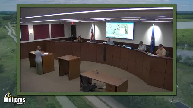 Commission approves two-lot subdivision; smaller lot kept agricultural because it contains oil well