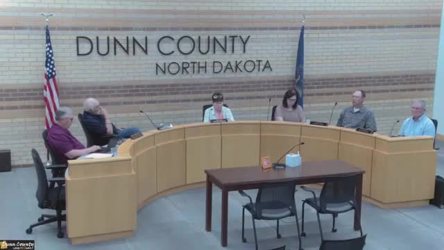 Commission tables review of employee merit scale after heated debate