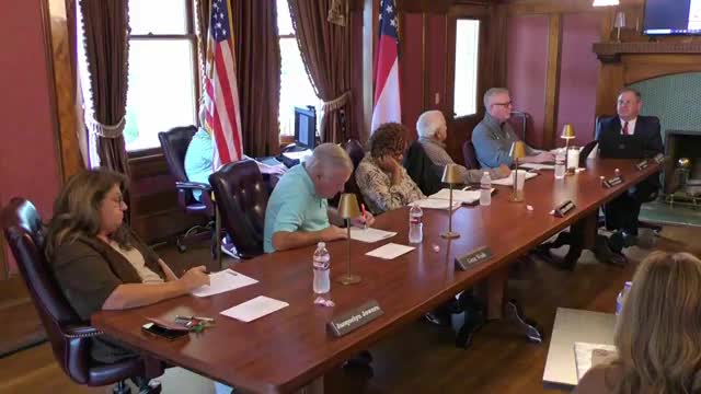 Board reviews updated Internet acceptable-use rule and debates employee leave changes; GARH policy tabled for further review