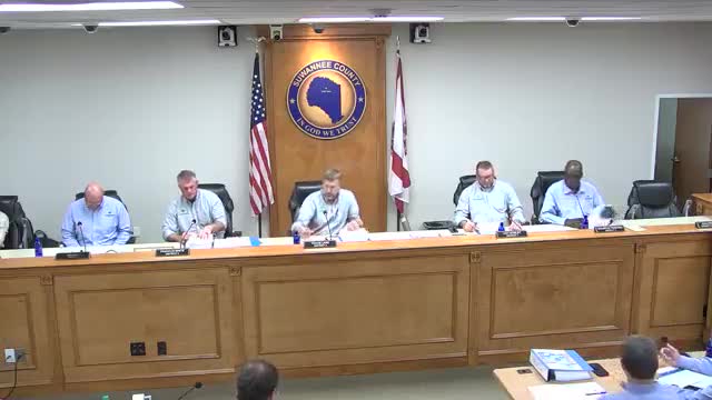 Commissioners ask staff to refine payroll "bring-to-minimum" numbers after salary-study briefing