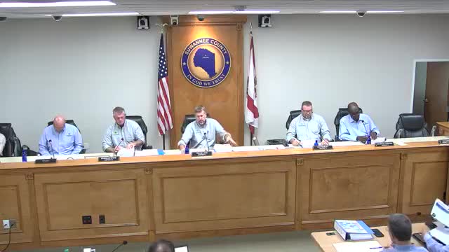 Commissioners discuss salary-study costs; staff told to refine 'bring-to-minimum' numbers before final hearing