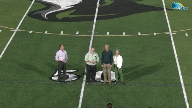 Hillcrest homecoming ceremony features alumni honor, cheer and drill performances and marching-band show