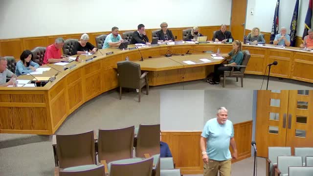 Resident urges one-way alley, says stop sign ignored and livestream audio inaudible